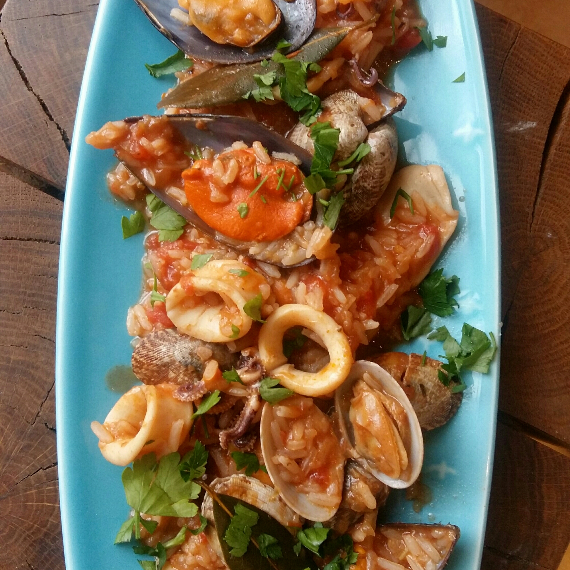 Ready in a flash: Portuguese seafood rice with clams, calamari and mussels